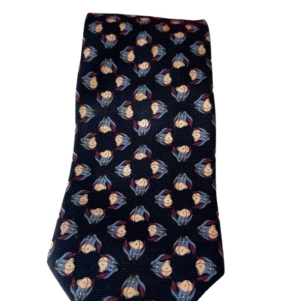 Pooh Neck Tie Featuring Eeyore 100% Polyester Dry Clean only.